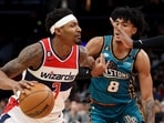 Bradley Beal #3 of the Washington Wizards drives around Jared Rhoden #8 of the Detroit Pistons in the second half at Capital One Arena. Bradley Beal #3 of the Washington Wizards drives around Jared Rhoden #8 of the Detroit Pistons in the second half at Capital One Arena.