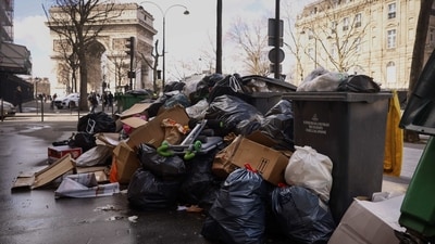 Uncollected garbage are pictured near the Arc de Triomphe in Paris, on March 14. Even the strikers themselves, who include garbage collectors, street cleaners and underground sewer workers, are concerned about what Paris is becoming in their absence, reported AP. (Thomas Padilla / AP) Uncollected garbage are pictured near the Arc de Triomphe in Paris, on March 14. Even the strikers themselves, who include garbage collectors, street cleaners and underground sewer workers, are concerned about what Paris is becoming in their absence, reported AP. (Thomas Padilla / AP)