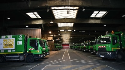 Garbage trucks are parked at an incineration plant, which is blocked by employees who are on strike to protest against the French government's proposed pensions reform in Ivry-sur-Seine, south of Paris, on March 14. Three incineration plants outside the capital have been hit by the work stoppages that have left entire pavements covered in black bags and overflowing bins, reported AFP (Christophe Archambault / AFP) Garbage trucks are parked at an incineration plant, which is blocked by employees who are on strike to protest against the French government's proposed pensions reform in Ivry-sur-Seine, south of Paris, on March 14. Three incineration plants outside the capital have been hit by the work stoppages that have left entire pavements covered in black bags and overflowing bins, reported AFP (Christophe Archambault / AFP)