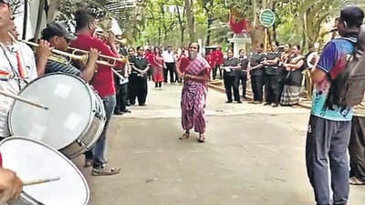 Antony, who returned to the school after the protest, called up the band baaja to perform in order to mark their victory. Work on the highway had resumed, and one of the oldest guardians of the school and other women staff danced delightedly on its tunes (HT Photo) Antony, who returned to the school after the protest, called up the band baaja to perform in order to mark their victory. Work on the highway had resumed, and one of the oldest guardians of the school and other women staff danced delightedly on its tunes (HT Photo)