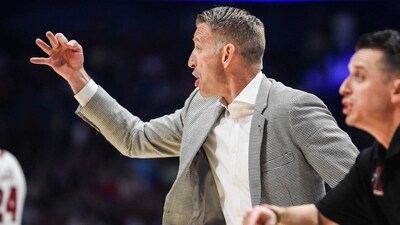 Nate Oats of the Alabama Crimson Tide signals to the court against the Texas A&M Aggies in the second half of the 2023 SEC Men's Basketball Tournament Championship game. (Getty Images via AFP) Nate Oats of the Alabama Crimson Tide signals to the court against the Texas A&M Aggies in the second half of the 2023 SEC Men's Basketball Tournament Championship game. (Getty Images via AFP)