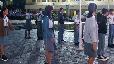 Indonesia: High school students gathering for the roll call on campus early in the morning in Kupang. (AFP) Indonesia: High school students gathering for the roll call on campus early in the morning in Kupang. (AFP)