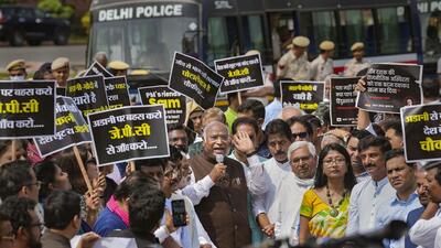 Leader of Opposition in Rajya Sabha Mallikarjun Kharge addresses fellow opposition MPs during a march from Parliament House to Enforcement Directorate over the Adani issue, in New Delhi on Wednesday. (PTI) Leader of Opposition in Rajya Sabha Mallikarjun Kharge addresses fellow opposition MPs during a march from Parliament House to Enforcement Directorate over the Adani issue, in New Delhi on Wednesday. (PTI)