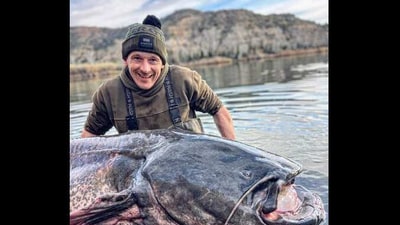 Man catches eight foot fish in Spain. (Instagram/@ ebromadcats) Man catches eight foot fish in Spain. (Instagram/@ ebromadcats)