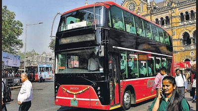Mumbai, India - February 21, 2023: Commuters board the India's first-ever electric AC double decker bus operating from CSMT to NCPA via Churchgate, in Mumbai, India, on Tuesday, February 21, 2023. (Photo by Bhushan Koyande/HT Photo) (HT PHOTO) Mumbai, India - February 21, 2023: Commuters board the India's first-ever electric AC double decker bus operating from CSMT to NCPA via Churchgate, in Mumbai, India, on Tuesday, February 21, 2023. (Photo by Bhushan Koyande/HT Photo) (HT PHOTO)