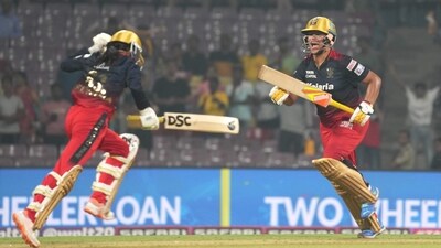 Royal Challengers Bangalore players celebrate their victory against UP Warriorz during the Women's Premier League (WPL) match in Navi Mumbai (PTI) Royal Challengers Bangalore players celebrate their victory against UP Warriorz during the Women's Premier League (WPL) match in Navi Mumbai (PTI)