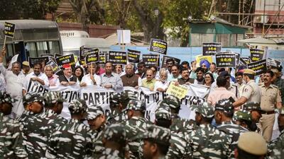 Police deployed additional forces and put up barricades to prevent the Opposition leaders from marching to the ED office. (PTI) Police deployed additional forces and put up barricades to prevent the Opposition leaders from marching to the ED office. (PTI)