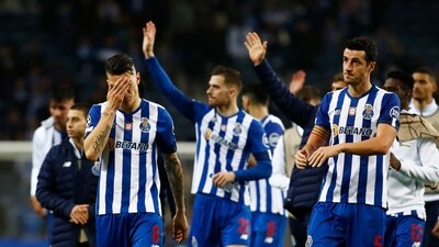 Soccer Football - Champions League - Round of 16 - Second Leg - FC Porto v Inter Milan - Estadio do Dragao, Porto, Portugal - March 14, 2023 FC Porto's Mateus Uribe and Ivan Marcano look dejected after the match REUTERS/Pedro Nunes (REUTERS)