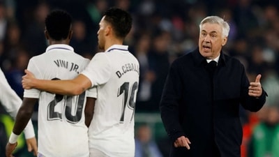 Real Madrid coach Carlo Ancelotti remonstrates with Vinicius Junior as Dani Ceballos looks on after the match (REUTERS)
