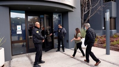 A customer is escorted into the Silicon Valley Bank headquarters in Santa Clara, California, U.S. (REUTERS)