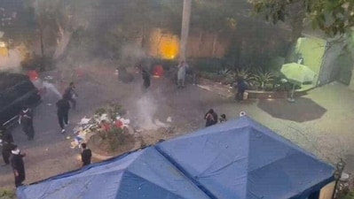 Imran Khan: Teargas still being fired into Imran Khan's compound. Imran Khan: Teargas still being fired into Imran Khan's compound.
