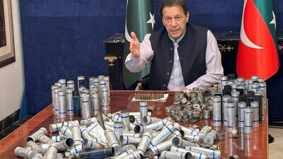 Imran Khan: Imran Khan with teargas shells allegedly fired into his home.