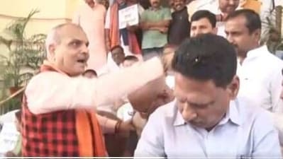 Ladoos were thrown as RJD & BJP MLAs enter into a scuffle at the State Assembly after RJD MLA offered BJP MLAs sweets following the bail to Lalu Yadav, Rabri Devi, Misa Bharati in land-for-job case. (ANI)