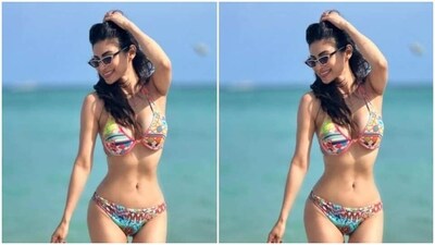 Mouni wore her tresses in beach wavy curls as she wore her brightest smile while posing for the cameras. (Instagram/@imouniroy) Mouni wore her tresses in beach wavy curls as she wore her brightest smile while posing for the cameras. (Instagram/@imouniroy)