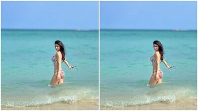 Mouni decked up in a multicoloured bikini featuring geometric patterns in shades of multiple colours. Showing off her toned body, Mouni played with sea waves as she posed for the pictures. (Instagram/@imouniroy) Mouni decked up in a multicoloured bikini featuring geometric patterns in shades of multiple colours. Showing off her toned body, Mouni played with sea waves as she posed for the pictures. (Instagram/@imouniroy)