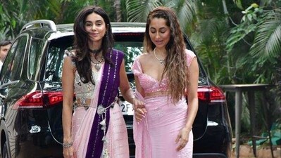 Sisters Shibani and Anushka Dandekarin matching pink sarees, arrive for the wedding function. Sisters Shibani and Anushka Dandekarin matching pink sarees, arrive for the wedding function.