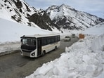 Vehicles seen passing through at Zojila mountain pass that connects Srinagar to the union territory of Ladakh, on March 16, 2023. Strategic Srinagar-Ladakh highway re-opens for traffic in record time of 68 days. 