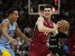 Miami Heat guard Tyler Herro (14) looks to pass under pressure from Memphis Grizzlies guard Desmond Bane (22). Miami Heat guard Tyler Herro (14) looks to pass under pressure from Memphis Grizzlies guard Desmond Bane (22).