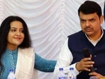 Amruta Fadnavis (left) Devendra Fadnavis (right)