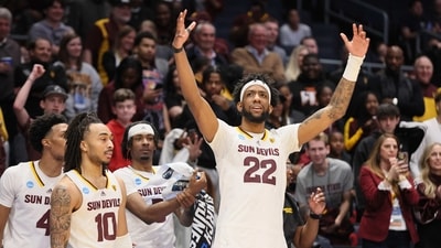 Warren Washington #22 of the Arizona State Sun Devils reacts from the bench late in the second half against the Nevada Wolf Pack in the First Four game of the NCAA Men's Basketball Tournament at University of Dayton Arena. (Getty Images via AFP) Warren Washington #22 of the Arizona State Sun Devils reacts from the bench late in the second half against the Nevada Wolf Pack in the First Four game of the NCAA Men's Basketball Tournament at University of Dayton Arena. (Getty Images via AFP)