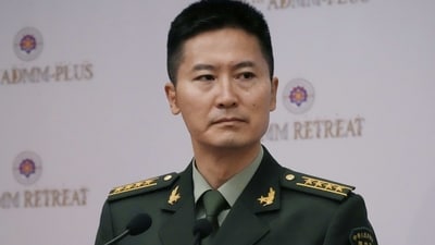 China's defense ministry spokesman Tan Kefei attends a news conference. (AP)