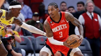 Houston Rockets guard Kevin Porter Jr. (3) looks to drive around Los Angeles Lakers guard Dennis Schroeder, left, during the first half of an NBA basketball game Wednesday, (AP) Houston Rockets guard Kevin Porter Jr. (3) looks to drive around Los Angeles Lakers guard Dennis Schroeder, left, during the first half of an NBA basketball game Wednesday, (AP)