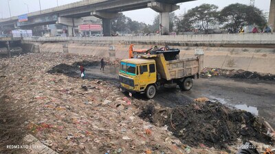 Ludhiana MC officials checking the waste being dumped in Sidhwan canal after cleaning in Ludhiana on Thursday. (HT file photo) Ludhiana MC officials checking the waste being dumped in Sidhwan canal after cleaning in Ludhiana on Thursday. (HT file photo)