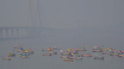 Mumbai, India - March 5, 2023: Boats are floating in the hazy weather near the Bandra worli sea link in Mumbai, India, on Sunday, March 5, 2023. (Photo by Satish Bate/ Hindustan Times) (Hindustan Times) Mumbai, India - March 5, 2023: Boats are floating in the hazy weather near the Bandra worli sea link in Mumbai, India, on Sunday, March 5, 2023. (Photo by Satish Bate/ Hindustan Times) (Hindustan Times)
