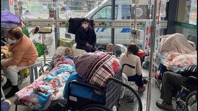 Patients lie on beds in the emergency department of a hospital, amid Covid-19 outbreak in Shanghai, China, on January 5, 2023. (REUTERS)
