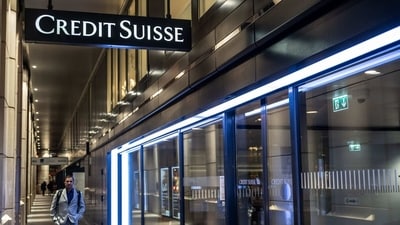 A Credit Suisse Group AG bank branch illuminated at night in Geneva, Switzerland. (Bloomberg)