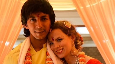 Anshuman Jha and Sierra Winters pose together at their Indian wedding. Anshuman Jha and Sierra Winters pose together at their Indian wedding.