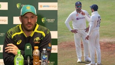 Aaron Finch; India skipper Rohit Sharma with Virat Kohli Aaron Finch; India skipper Rohit Sharma with Virat Kohli
