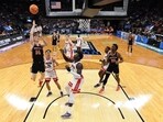 Princeton Tigers guard Matt Allocco (14) shoots against Arizona Wildcats center Oumar Ballo (11) and guard Kerr Kriisa (25) during the first half at Golden 1 Center.