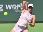 Mar 16, 2023; Indian Wells, CA, USA;  Iga Swiatek (POL) hits a shot as she defeated Sorana Cristea (ROU) in her quarterfinal match in the BNP Paribas Open at the Indian Wells Tennis Garden. Mandatory Credit: Jayne Kamin-Oncea-USA TODAY Sports
