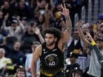 Anthony Lamb #40 of the Golden State Warriors reacts after making a three-point shot against the New Orleans Pelicans during the third quarter at Chase Center
