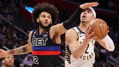 Andrew Nembhard #2 of the Indiana Pacers tries to drive around Isaiah Livers #12 of the Detroit Pistons during the first half at Little Caesars Arena on March 13, 2023 in Detroit, Michigan. (Getty Images via AFP) Andrew Nembhard #2 of the Indiana Pacers tries to drive around Isaiah Livers #12 of the Detroit Pistons during the first half at Little Caesars Arena on March 13, 2023 in Detroit, Michigan. (Getty Images via AFP)