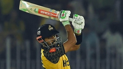 Peshawar Zalmi's captain Babar Azam plays a shot during the Pakistan Super League (PSL) T20 cricket match between Peshawar Zalmi and Multan Sultans at the Rawalpindi Cricket Stadium, in Rawalpindi on March 10, 2023. (Photo by Aamir QURESHI / AFP) (AFP)