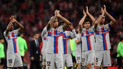 Barcelona's Brazilian forward Raphinha (C) and teammates celebrate victory at the end of the Spanish league football match between Athletic Club Bilbao and FC Barcelona at the San Mames stadium in Bilbao on March 12, 2023. - FC Barcelona won 0-1. (Photo by ANDER GILLENEA / AFP) (AFP) Barcelona's Brazilian forward Raphinha (C) and teammates celebrate victory at the end of the Spanish league football match between Athletic Club Bilbao and FC Barcelona at the San Mames stadium in Bilbao on March 12, 2023. - FC Barcelona won 0-1. (Photo by ANDER GILLENEA / AFP) (AFP)