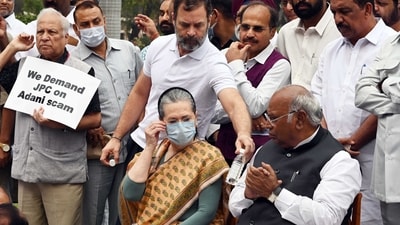 Rahul Gandhi with Congress MPs during a protest over Adani issue at the Parliament House Complex on Friday. (Hindustan Times) Rahul Gandhi with Congress MPs during a protest over Adani issue at the Parliament House Complex on Friday. (Hindustan Times)