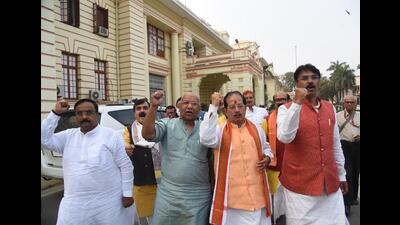 Leader of Opposition Vijay Kumar Sinha demonstrates with party legislators outside the Bihar Assembly on Thursday. (Santosh Kumar/HT Photo) Leader of Opposition Vijay Kumar Sinha demonstrates with party legislators outside the Bihar Assembly on Thursday. (Santosh Kumar/HT Photo)