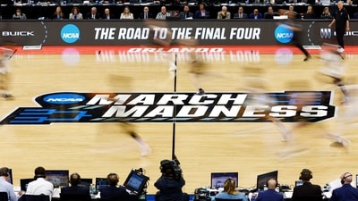 A general view of NCAA March Madness branding on the court. (Getty Images via AFP) A general view of NCAA March Madness branding on the court. (Getty Images via AFP)