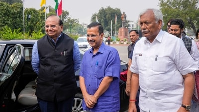 Delhi LG VK Saxena, chief minister Arvind Kejriwal and Speaker Ram Niwas Goel arrive at the Delhi assembly on the first day of the Budget Session. (PTI)