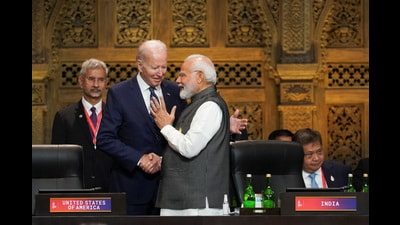 Prime Minister Narendra Modi greets US President Joe Biden as India's Foreign Minister S Jaishankar looks on during the G20 leaders' summit in Bali, Indonesia, on November 15, 2022. (REUTERS) Prime Minister Narendra Modi greets US President Joe Biden as India's Foreign Minister S Jaishankar looks on during the G20 leaders' summit in Bali, Indonesia, on November 15, 2022. (REUTERS)