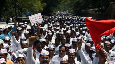 Pune zilla parishad staff hold protest at Collectorate on Friday. Many government and semi-government employees participated in the protest march for the implementation of the old pension scheme. (HT)