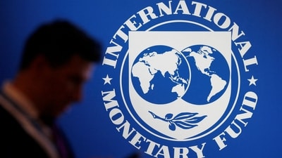 IMF-Pakistan Deal: A participant stands near a logo of IMF. (Reuters)