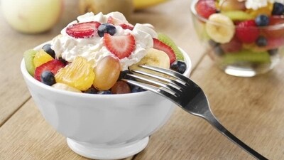 Fruit Salad with Yogurt: Yogurt is a good source of protein and can be mixed with some fresh fruits like bananas, apples, and pomegranates to make a tasty and healthy fruit salad. (File Photo) Fruit Salad with Yogurt: Yogurt is a good source of protein and can be mixed with some fresh fruits like bananas, apples, and pomegranates to make a tasty and healthy fruit salad. (File Photo)