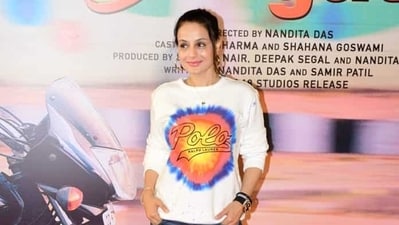 Ameesha Patel made a rare appearance at the Zwigato screening on Friday. She arrived in a white tee and denim shorts. She will now be seen in Gadar 2. (Varinder Chawla) Ameesha Patel made a rare appearance at the Zwigato screening on Friday. She arrived in a white tee and denim shorts. She will now be seen in Gadar 2. (Varinder Chawla)