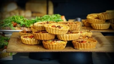 Mini Quiches with Spinach and Bacon: These bite-sized savoury pies are packed with protein and veggies and can be made ahead of time and reheated for a quick snack. Don't forget to sprinkle some herbs and grated cheese on top. (Pexels) Mini Quiches with Spinach and Bacon: These bite-sized savoury pies are packed with protein and veggies and can be made ahead of time and reheated for a quick snack. Don't forget to sprinkle some herbs and grated cheese on top. (Pexels)