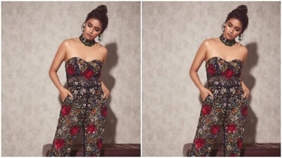 Keerthy added more oomph to her look with a statement green-stone studded neck choker and matching statement earrings from the house of Karishma Joolry.&nbsp; (Instagram/@keerthysureshofficial)