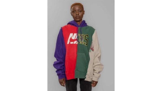 Uganda’s Bobby Kolade, 32 wants his genderless clothing brand to change how his country views the used clothing shipped in from the Global North. Currently, a lot of it is resold at rock-bottom rates, hurting the local textile industry. He aims to turn the discards into high-end designer wear that can then be resold at a heavy premium. &nbsp;An ongoing collection, Return to Sender, consists of garments such as frayed denim jackets, patchwork hoodies and panelled sweatpants, each made from multiple shipped-in versions of themselves. Four-panelled T-shirts and hoodies (above) are recreated from parts of different tees.(Photo courtesy buzigahill.com)